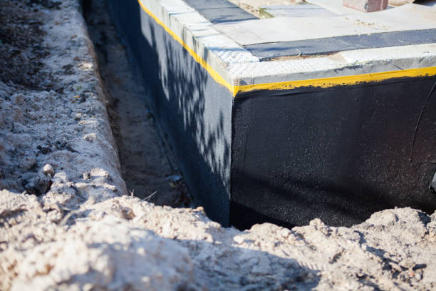 Professional Waterproofing technician working in Vesper, WI